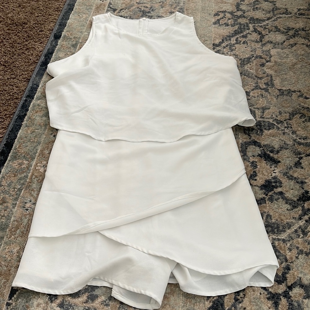 Never worn. Romper